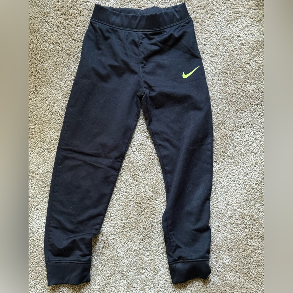Nike Kids Black Joggers with Green Logo